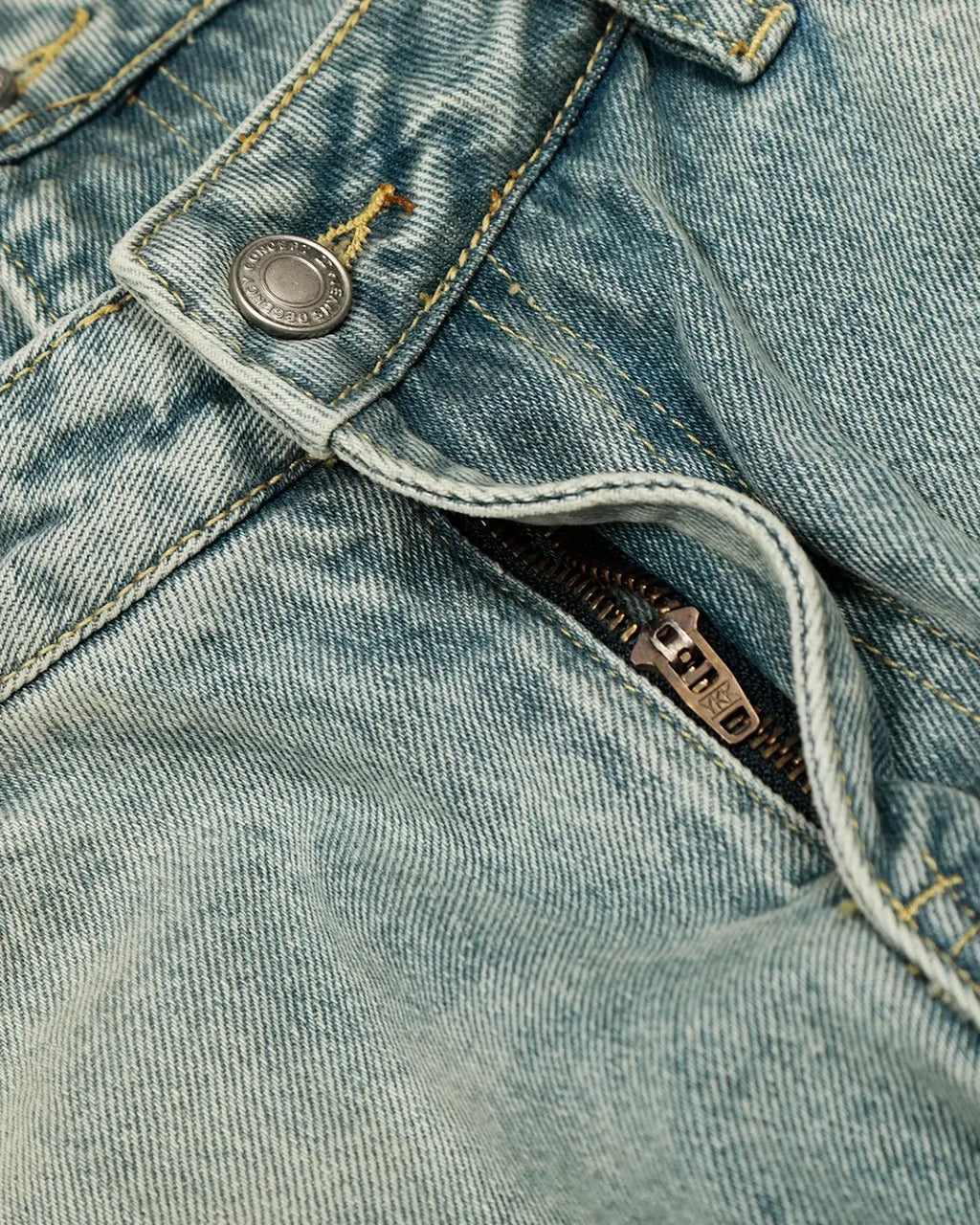 Acid washed baggy jeans with double waist design by INFLATION streetwear, featuring a relaxed fit and distressed detailing.