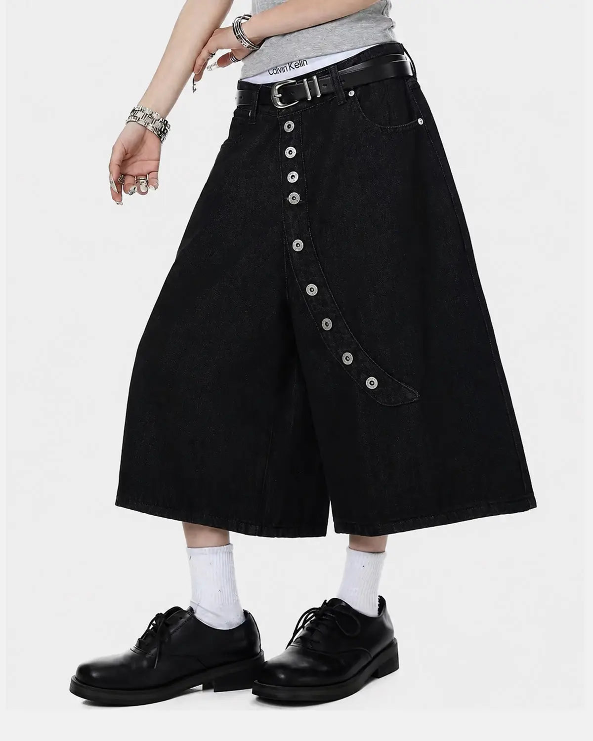 Inflation Streetwear asymmetric button raw denim jorts, casual men's pants with raw hem and unique design details.