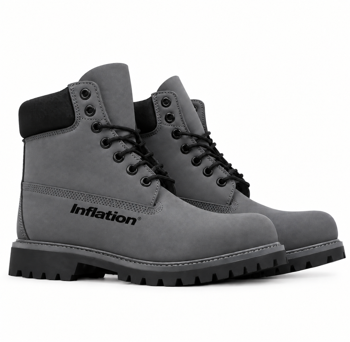 Inflation brand inflation boots with sturdy rubber soles and reinforced toe caps, suitable for outdoor work and cold weather.