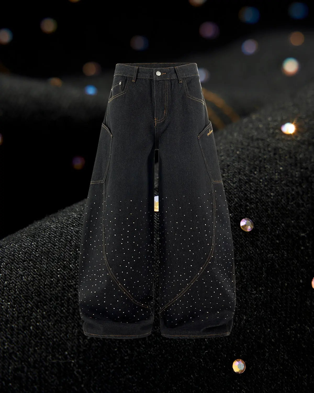 Colorful rhinestone raw barrel jeans from Inflation Streetwear, featuring vibrant embellishments and distressed denim details.