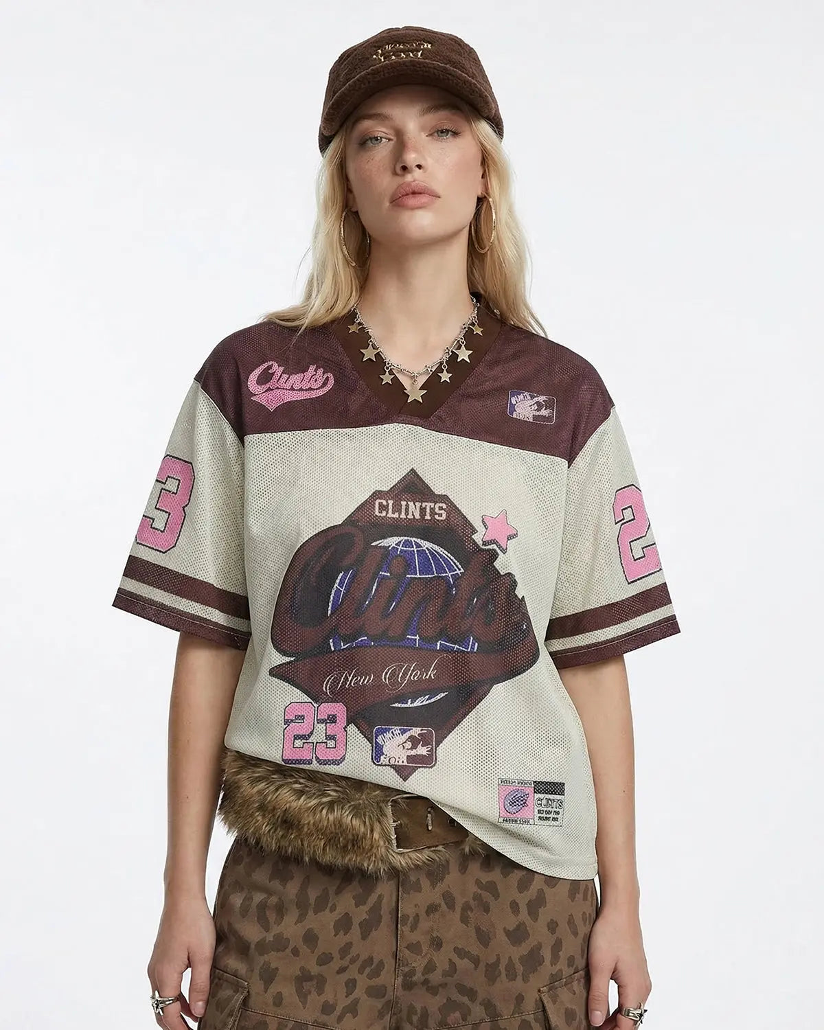Retro Graphic Mesh Jersey T-shirt by INFLATION featuring bold mesh fabric with vintage-inspired graphic design.