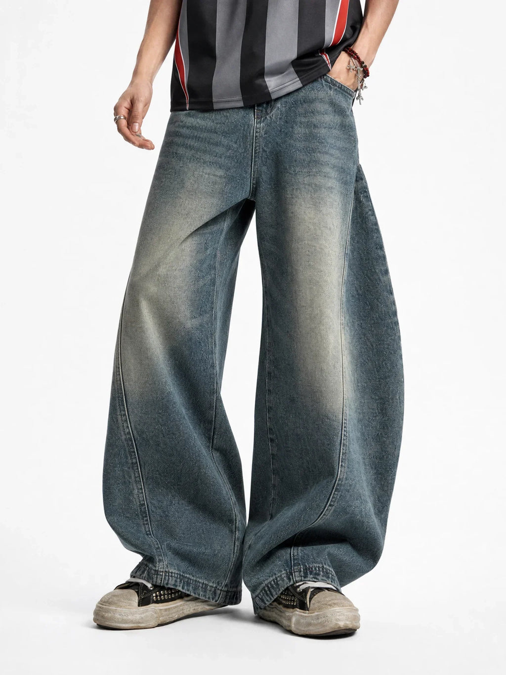 Distressed Supper Baggy Jeans by INFLATION, stylish streetwear pants with a relaxed, oversized fit and faded, worn-in denim look.